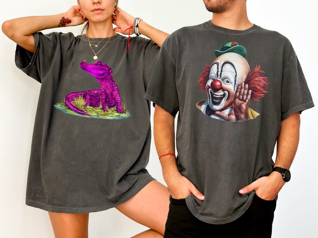 Models wearing t shirts featuring Bulk Styles artwork designs including an alligator illustration and clown character by Mark Francis